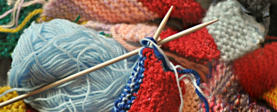 Knitting needles and colorful yarn