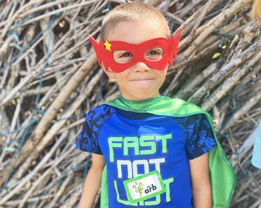 superhero kid at day camp, photo by Arb staff