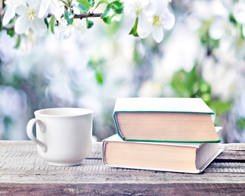 Spring books and coffee, photo by stanislavsalamanov/shutterstock