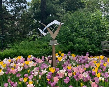 Upwards sculpture with tulips