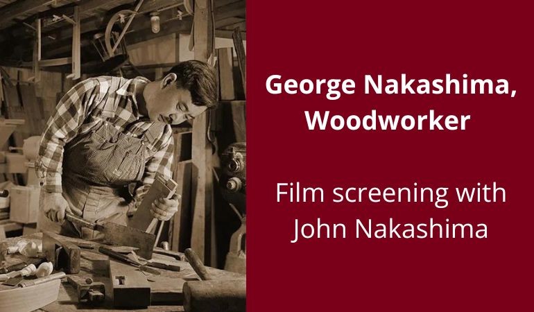 George Nakashima working on a wood table with maroon background